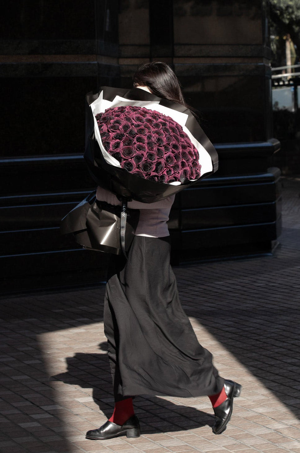 Noir Velvet deep plum rose bouquet with dense rose arrangement