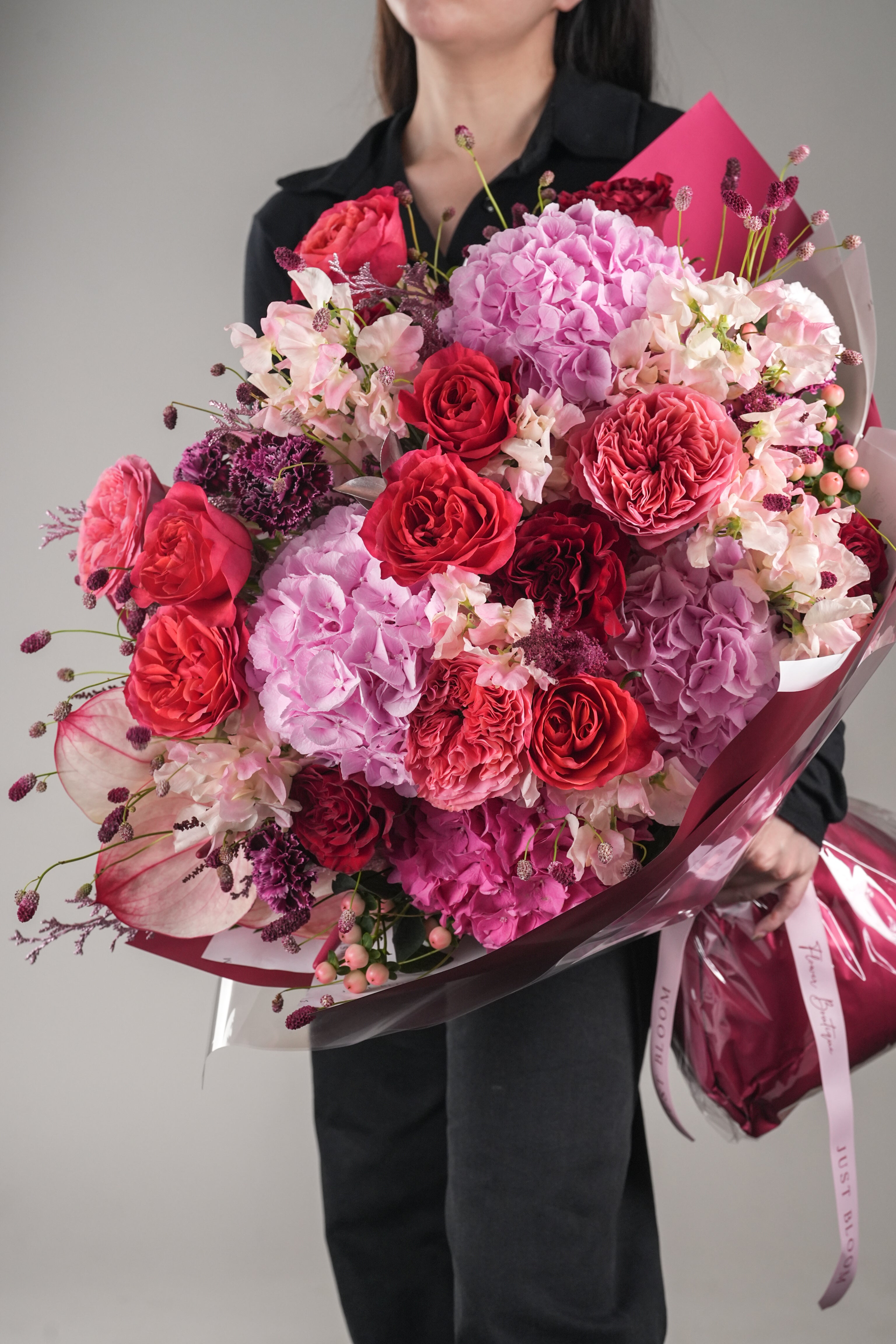 Nyla bouquet with pink garden roses, hydrangeas, anthuriums and fillers