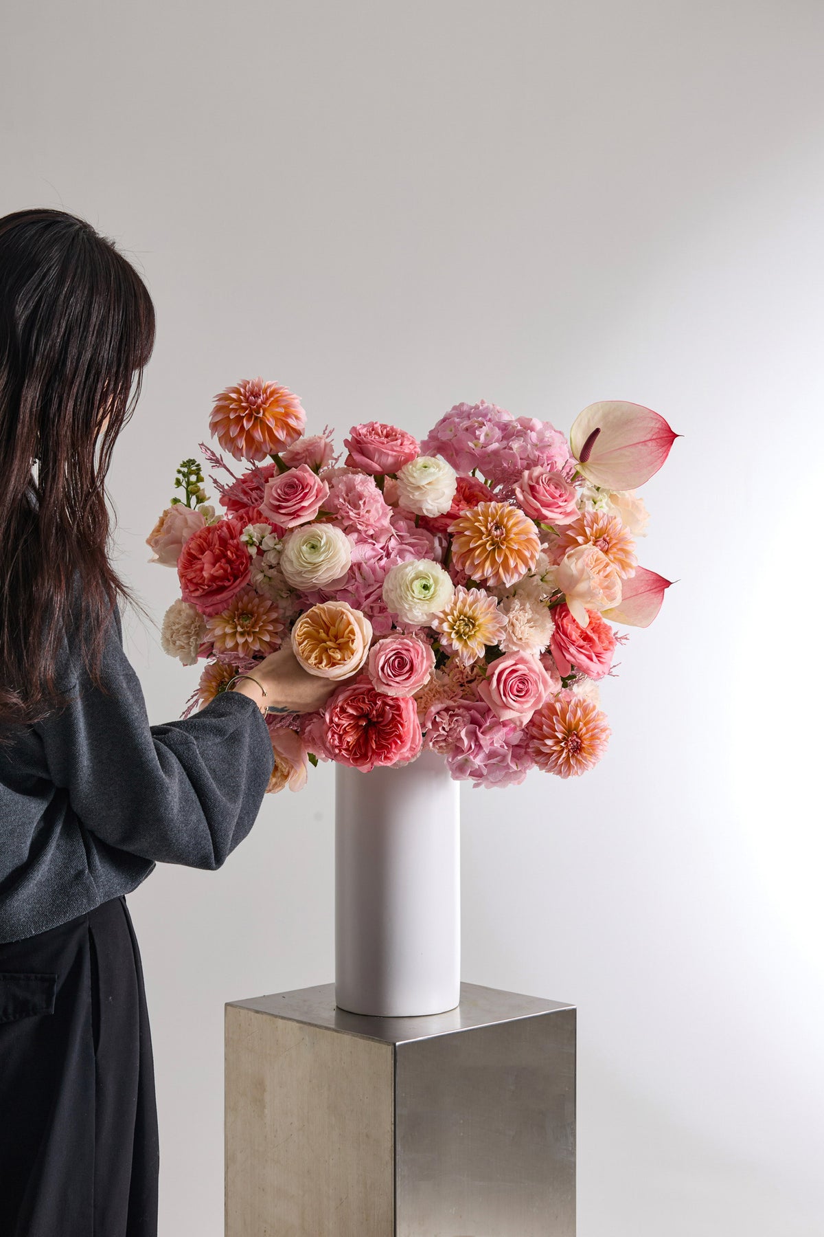 Petal Heirloom Vase Arrangement with Soft Peach and Pink Garden Roses, Dahlias, Ranunculuses, Hydrangeas, Stock, Anthuriums, Eustomas, Carnations, and Tinted Foliage by Just Bloom Hong Kong