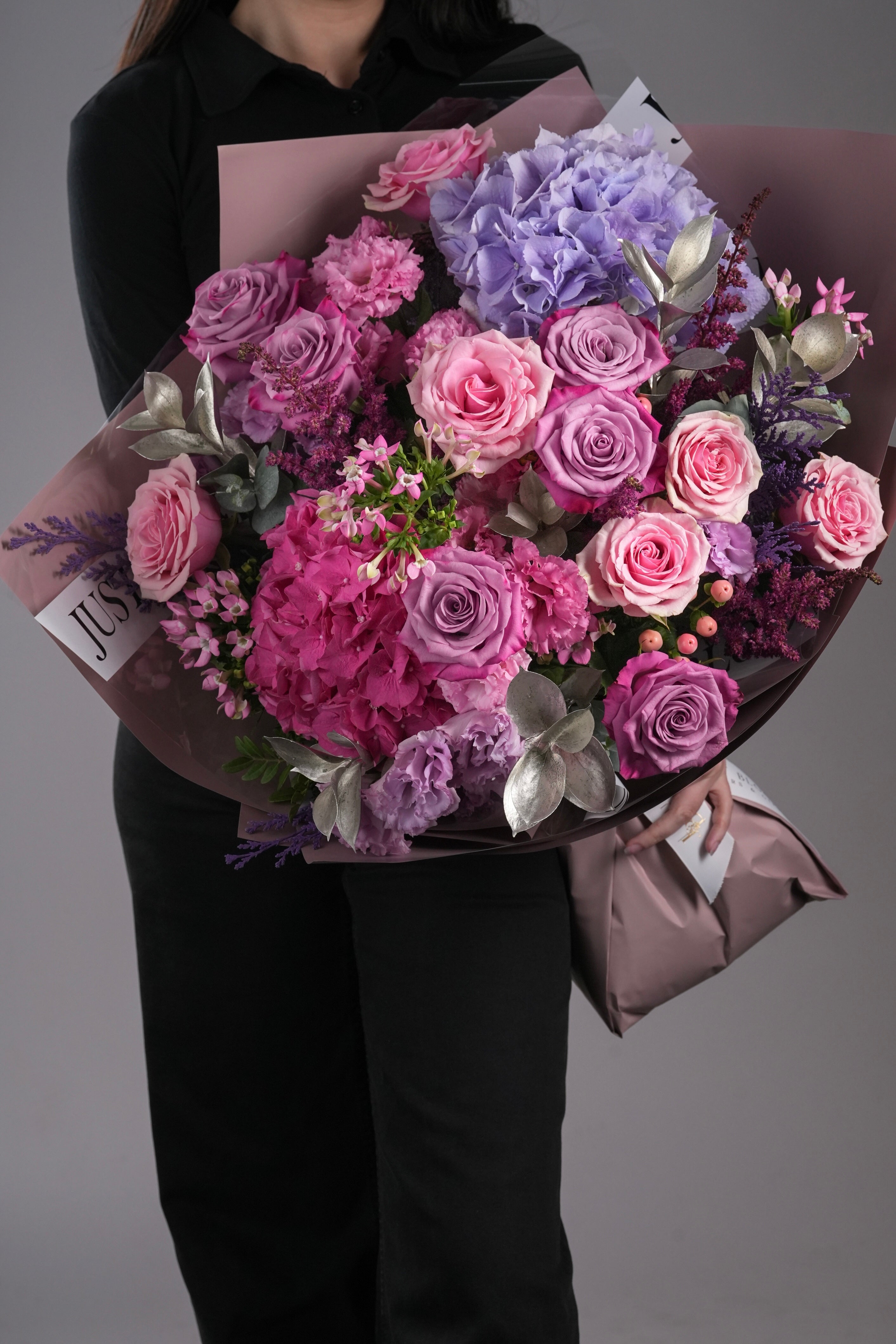 Ruby bouquet with romantic pink and purple flowers including hydrangeas and roses