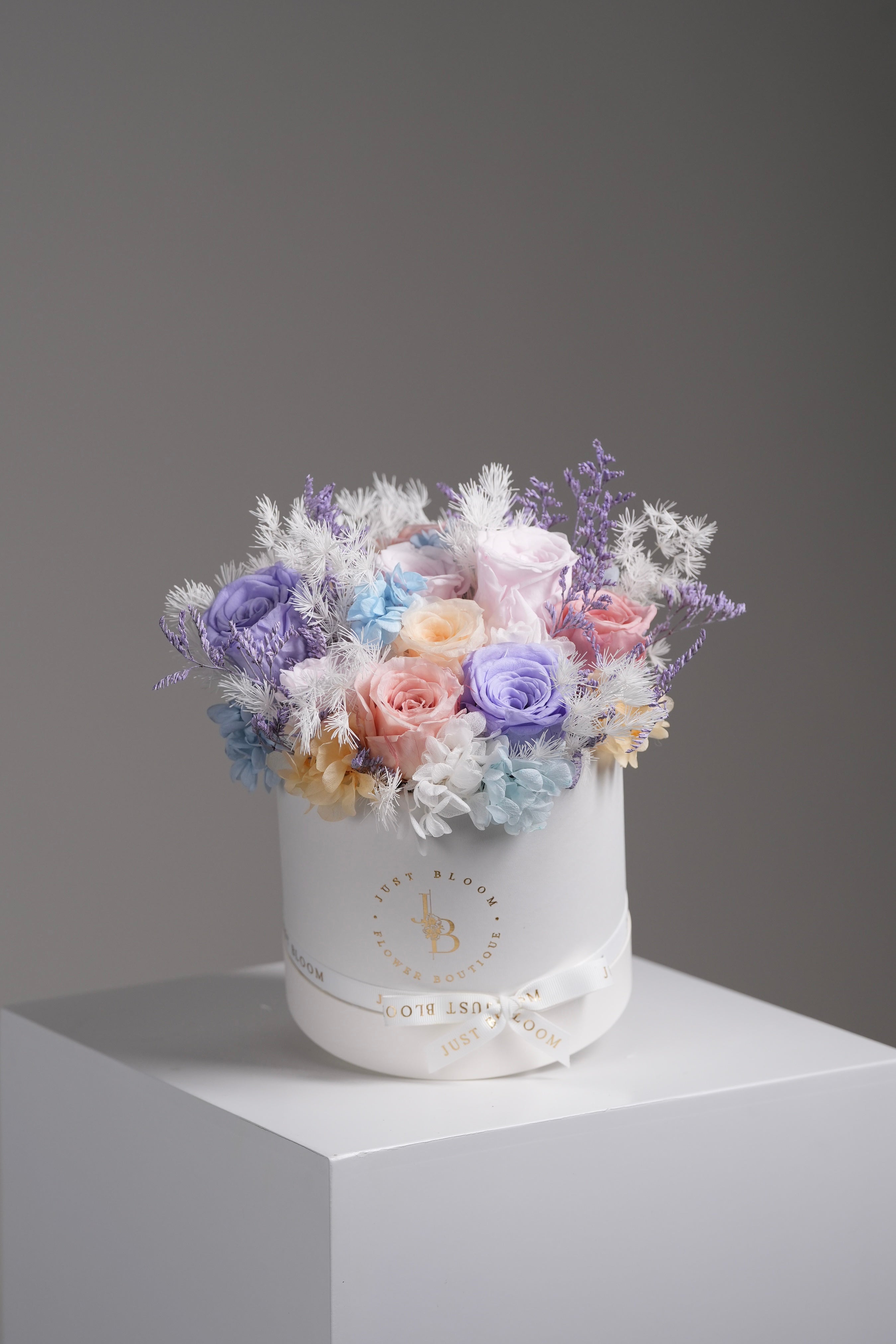Samuel preserved flower box with pastel roses in lilac, blush, and baby blue