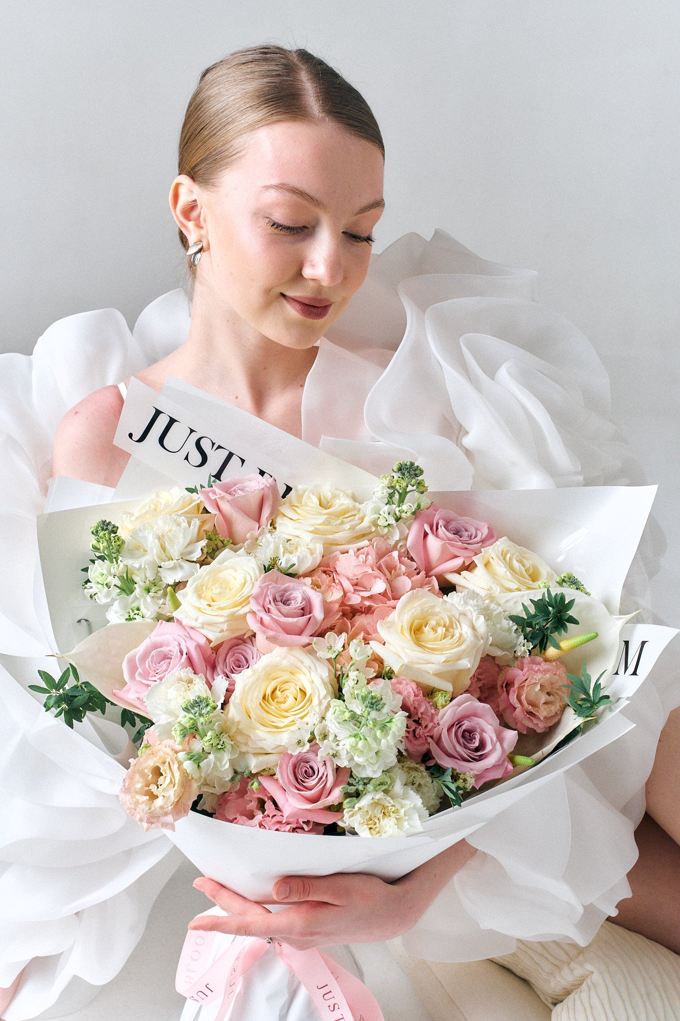 Sweet Moments pastel pink and white rose bouquet with hydrangeas and carnations