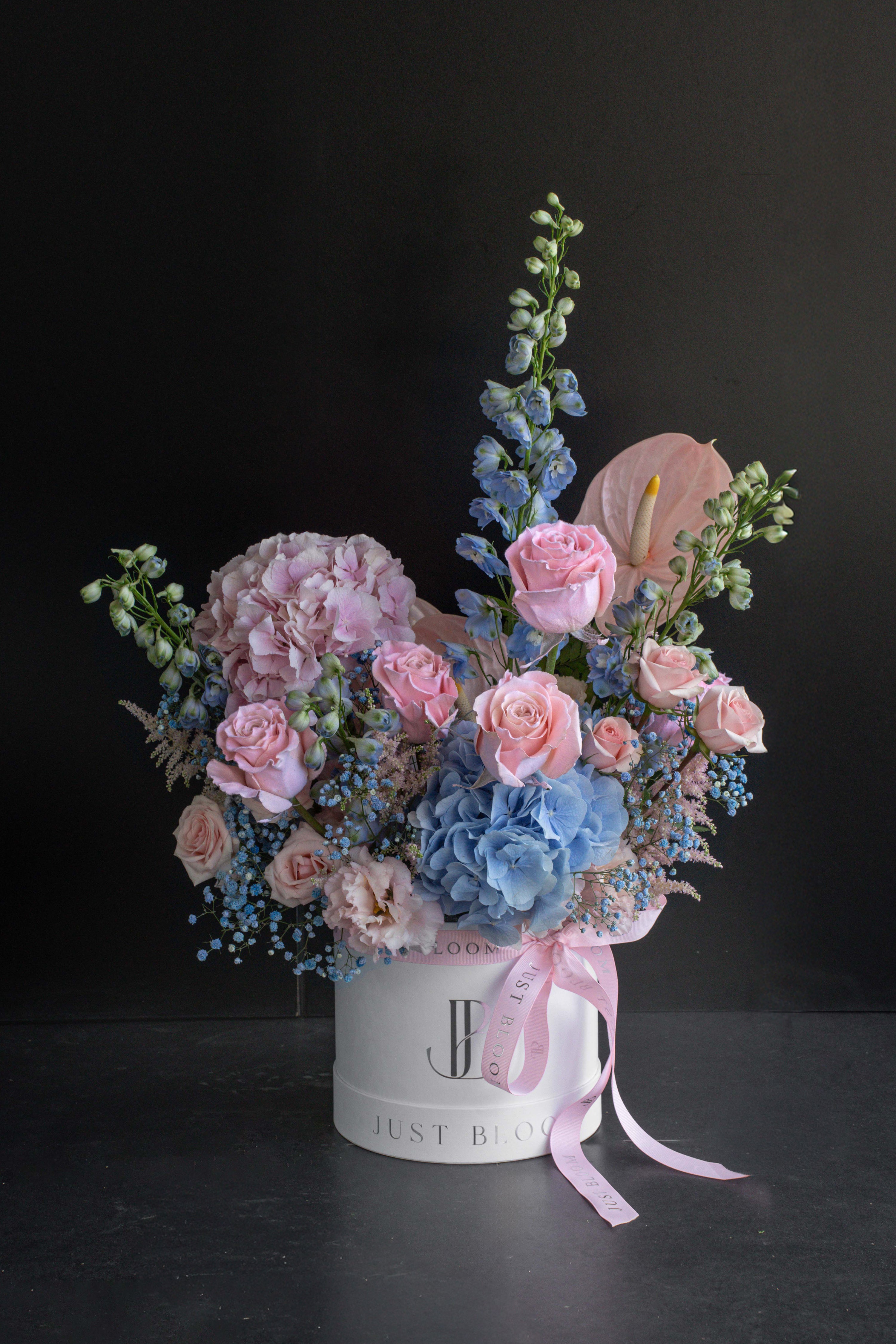 Sweet Rhapsody flower box arrangement of pink and blue blooms in a white Just Bloom box against a black backdrop — Just Bloom Hong Kong