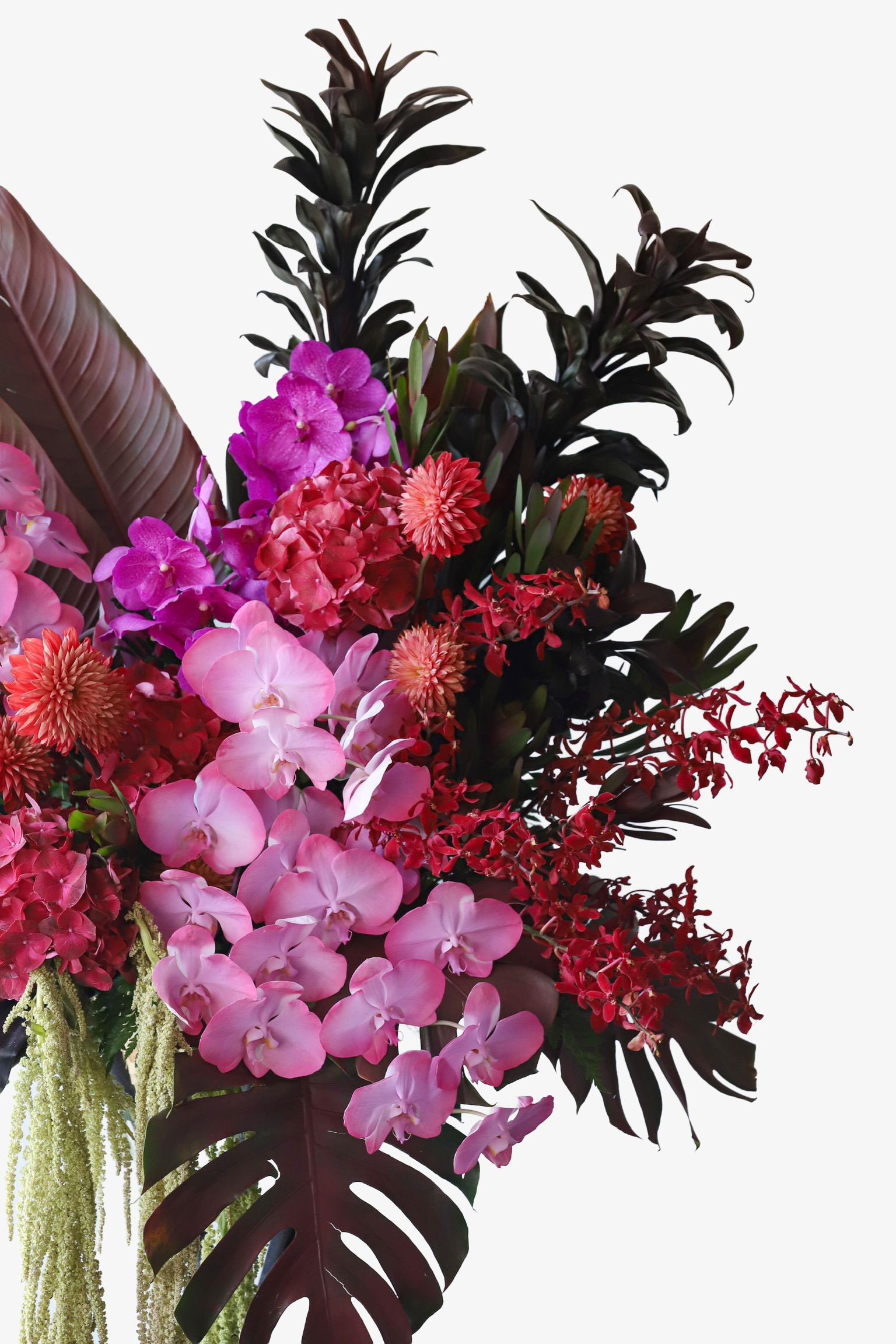 Detail shot of Tropical Fire flower stand by Just Bloom Hong Kong showcasing magenta vanda orchids, pink phalaenopsis orchids, coral dahlias and red seasonal fillers