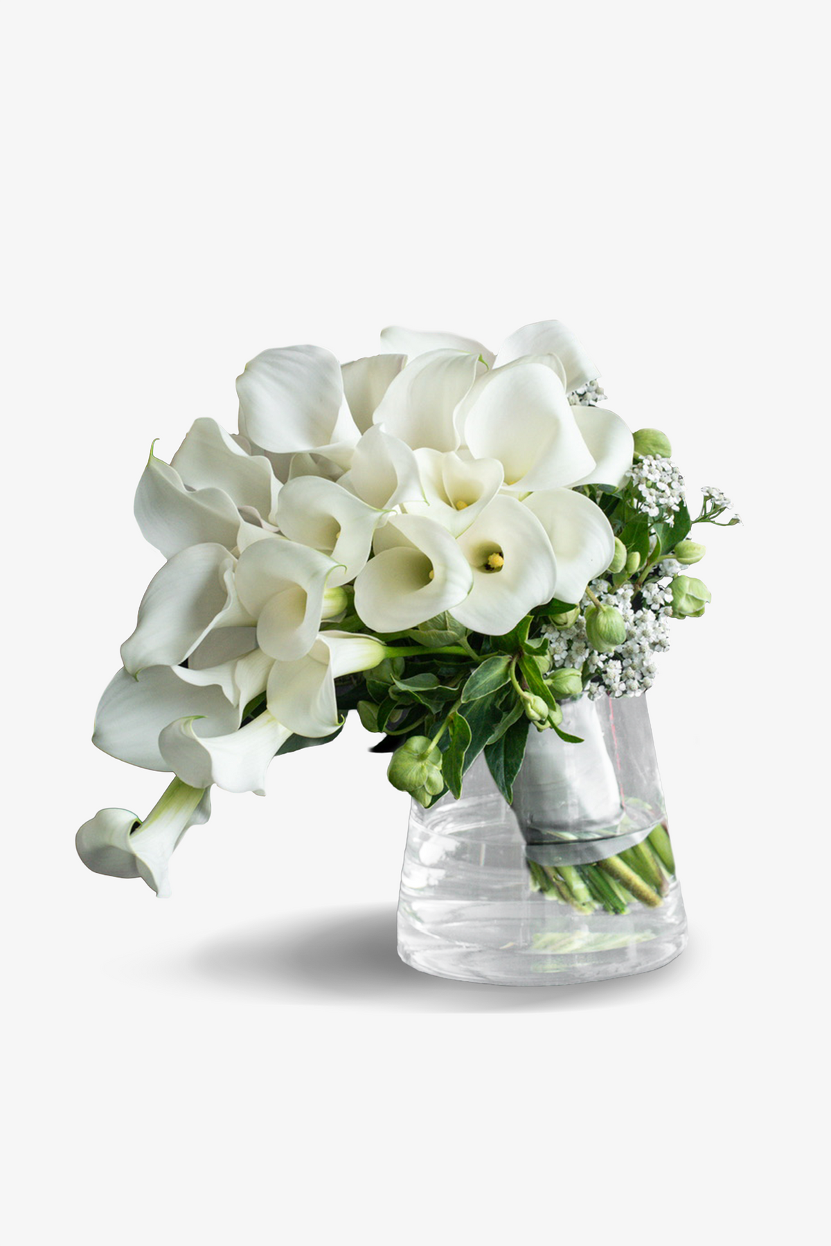 A Lifetime with You bridal bouquet resting in a glass vase , showing the full rounded dome of cascading white blooms with green bud details