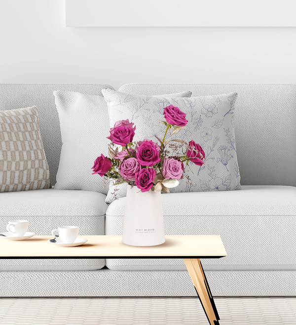 Floral arrangement of Fuchsia and Purple roses with green foliage showcased in a white vase by Just bloom × Hong Kong Florist, blending modern and classic elements for an elegant and romantic ambiance.