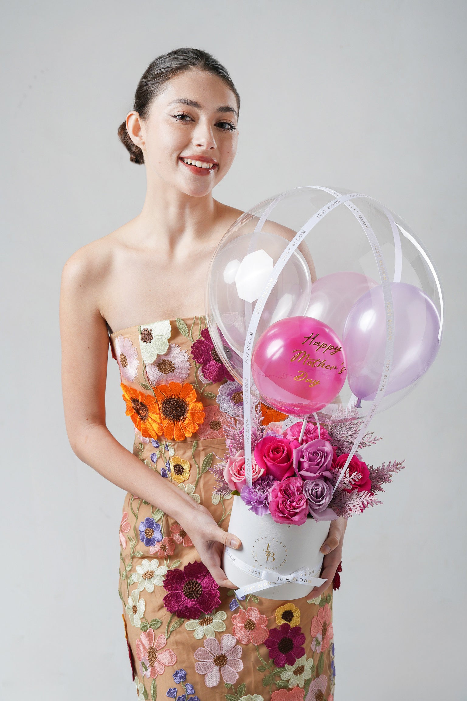 Warm Season - A Mother’s Day flower box featuring pink and purple roses with a crystal balloon topper. A vibrant and cheerful floral gift for Mother’s Day 2025 from Just Bloom HK.