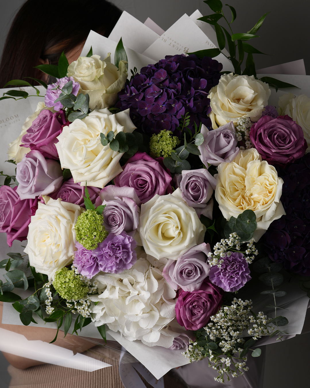 justbloom-emersyn-closeup-purple-cream-roses-hydrangea-carnation