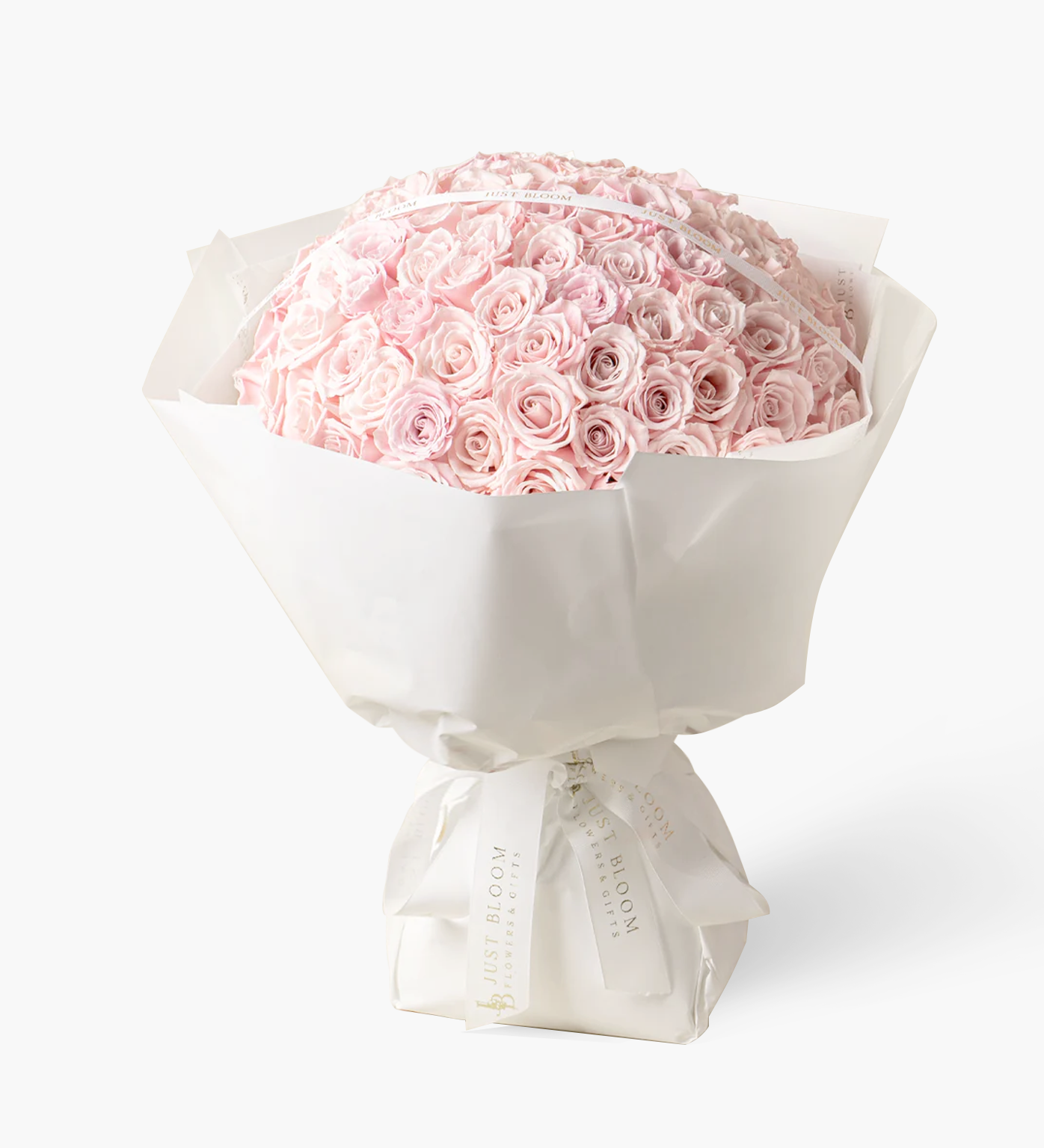 Lennon large pink rose bouquet displayed on stand showing impressive scale and dome arrangement