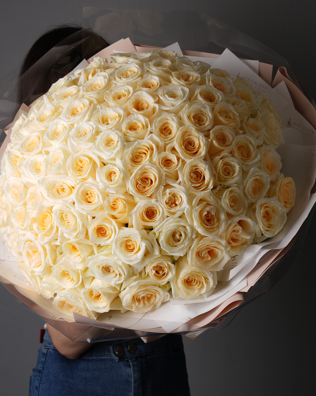 Close-up of Margaret giant bouquet showing creamy yellow roses in layered petals