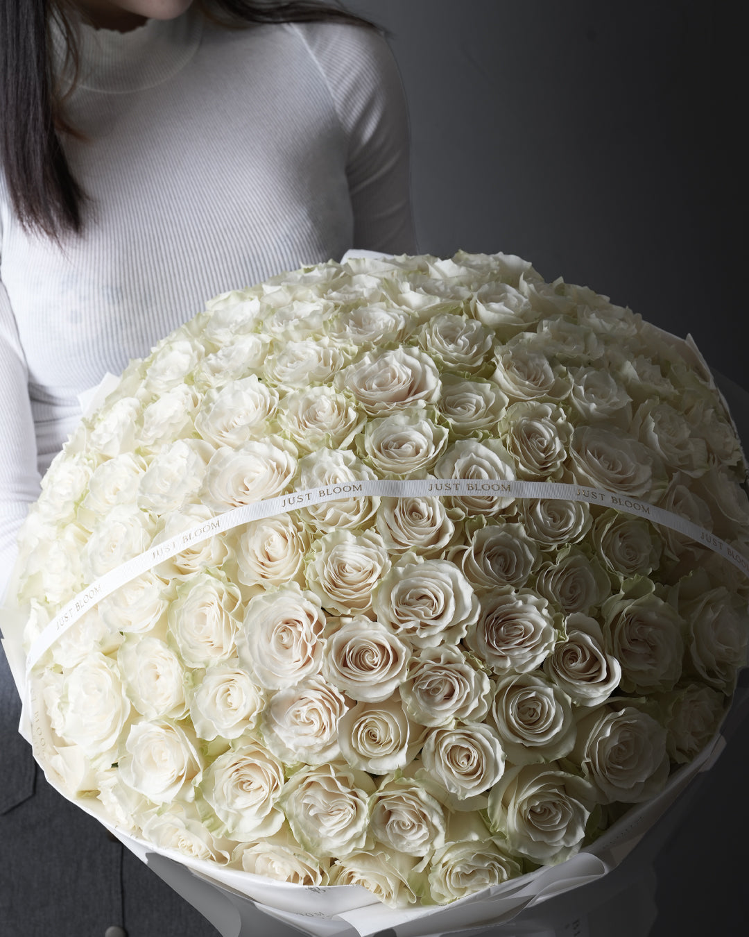 Mondial bouquet featuring 99 stems of premium white Mondial roses