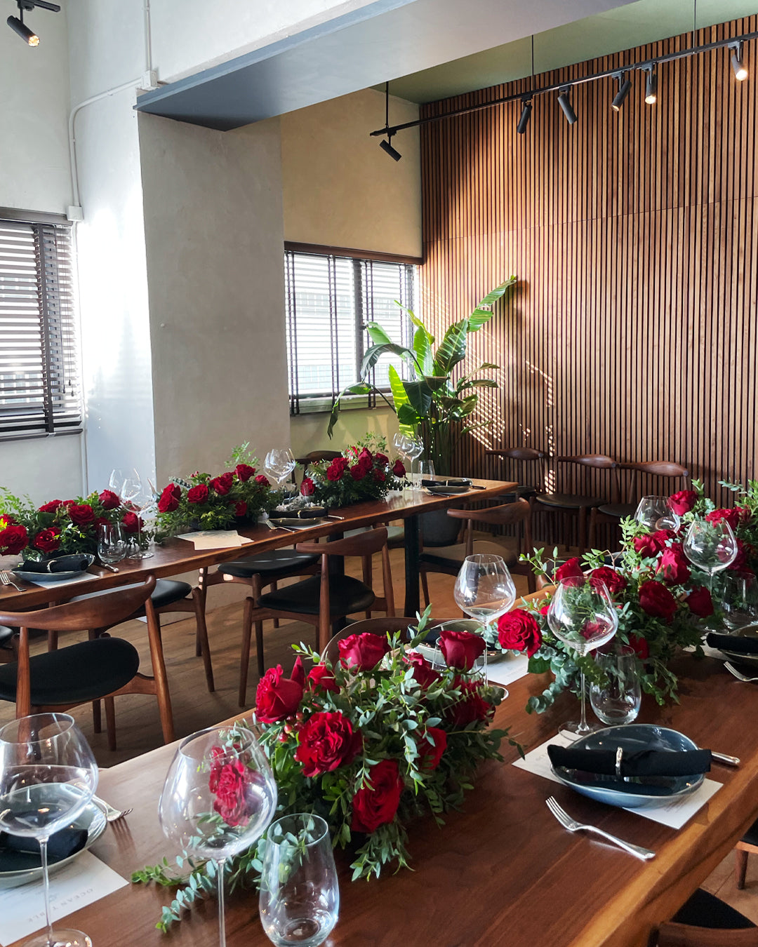 My Heart red rose table arrangement with lush greenery and Dutch foliage