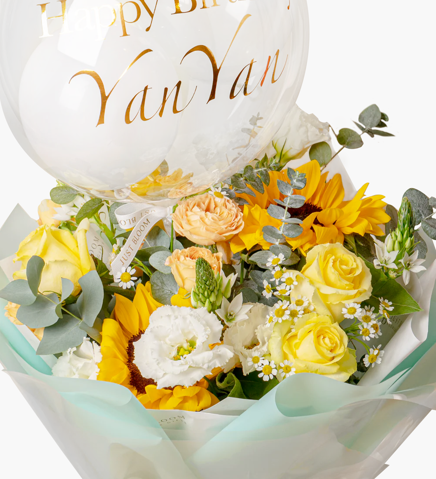 Paige flower bouquet closeup with bright yellow sunflowers and fresh fillers